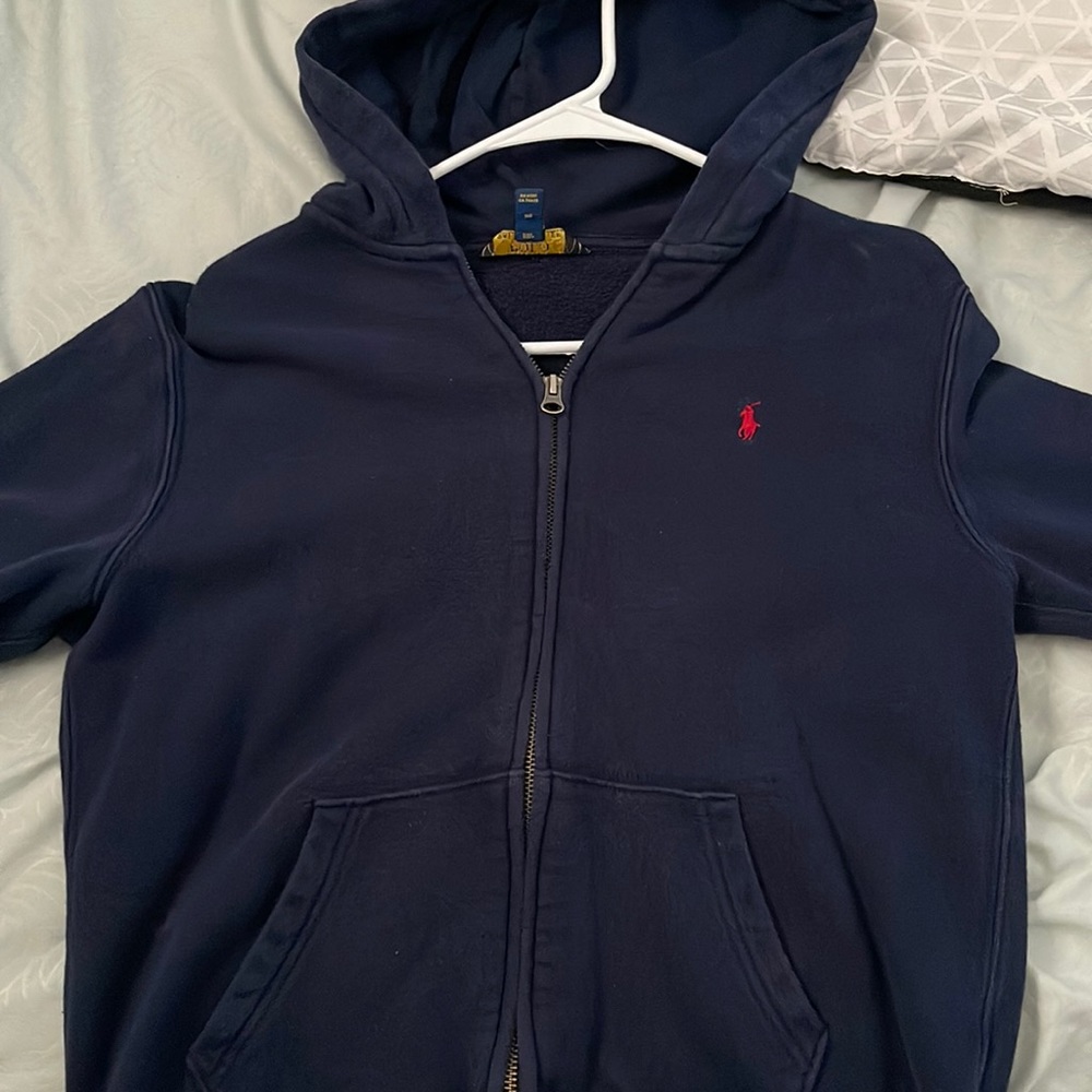 Blue and red polo sweater